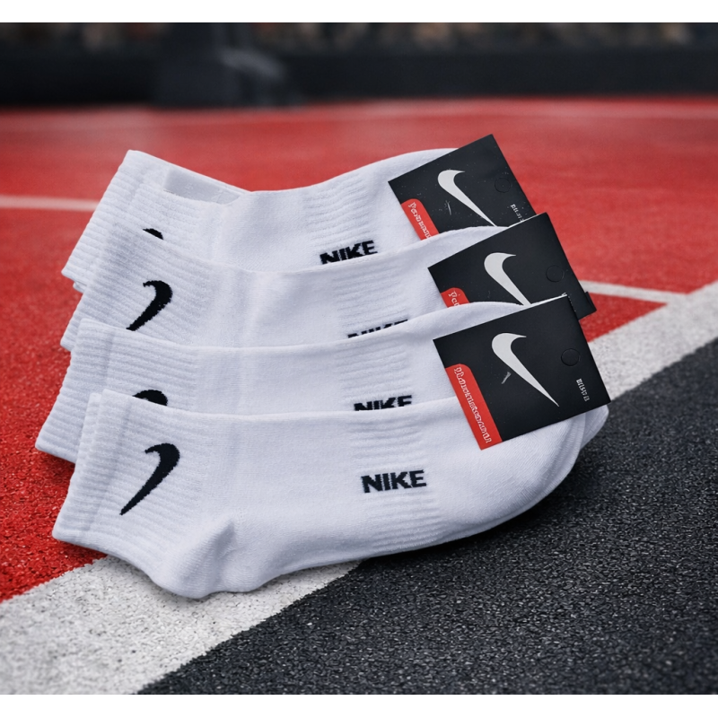 12 пар в упаковці шкарпетки середні  з резинкою на стопі NIKE 41-45р.